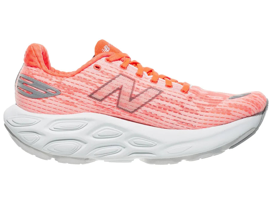 Women's New Balance Balos v1. Light Red upper. White midsole. Medial view.