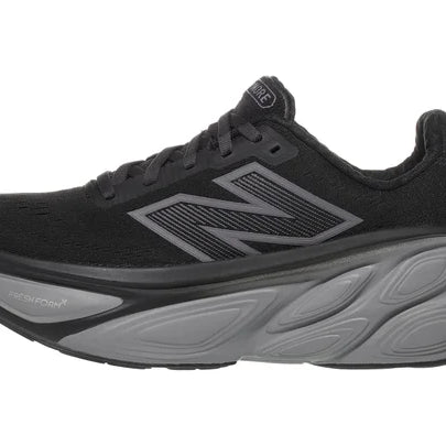 Women's New Balance Fresh Foam X More v5. Black upper. Grey midsole. Lateral view.