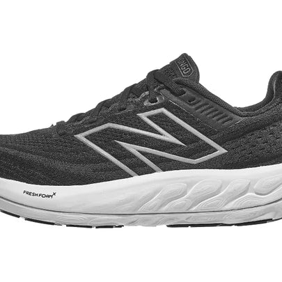 Women's New Balance Vongo v6. Black upper. White midsole. Lateral view.