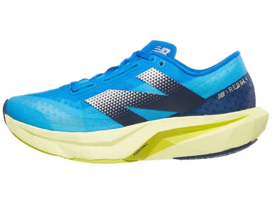 Women's New Balance FuelCell Rebel v4 in Spice Blue/Limelight/Blue Oasis — side profile