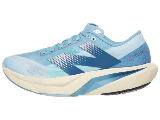 Women's New Balance Rebel v4. Blue upper. Off white midsole. Lateral view.