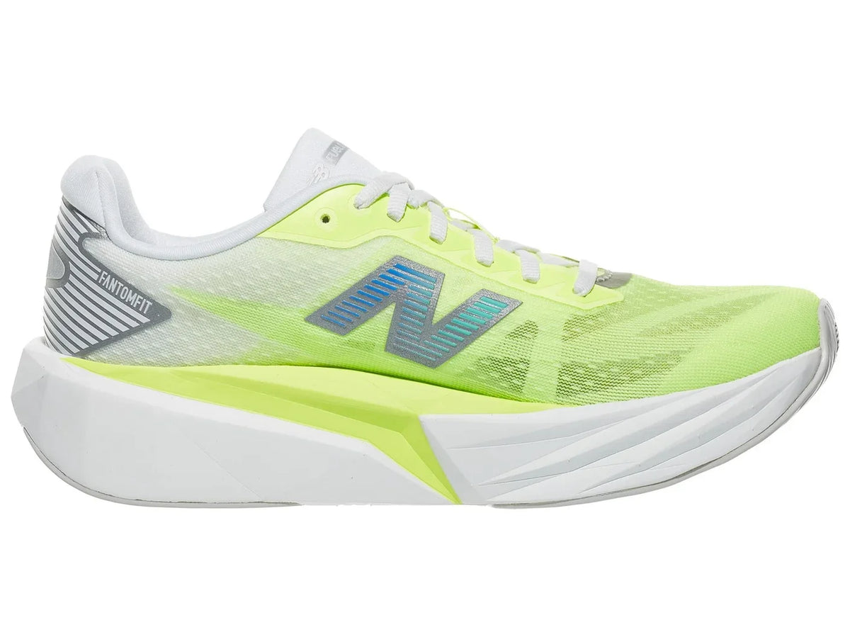 Women's New Balance Rebel v5. Neon yellow upper. White and neon yellow midsole. Medial view.
