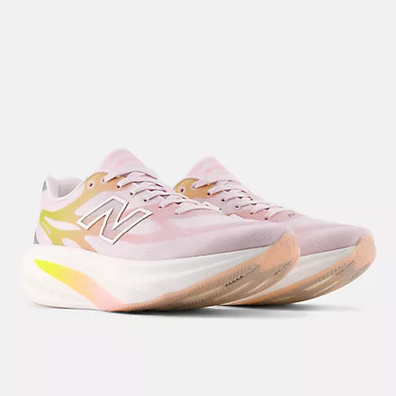 Women's New Balance Supercomp Rebel. Pink upper. White midsole. Lateral view.