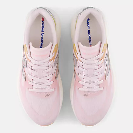 Women's New Balance Supercomp Rebel. Pink upper. White midsole. Top view.