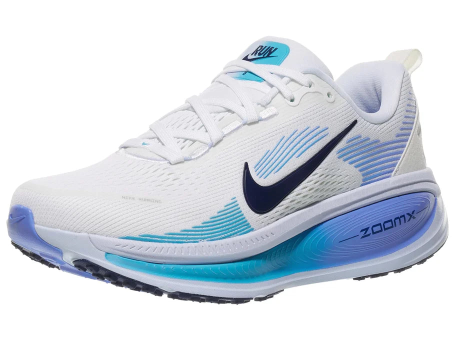 Women's Nike Vomero 18. White upper. Blue midsole. Lateral view.