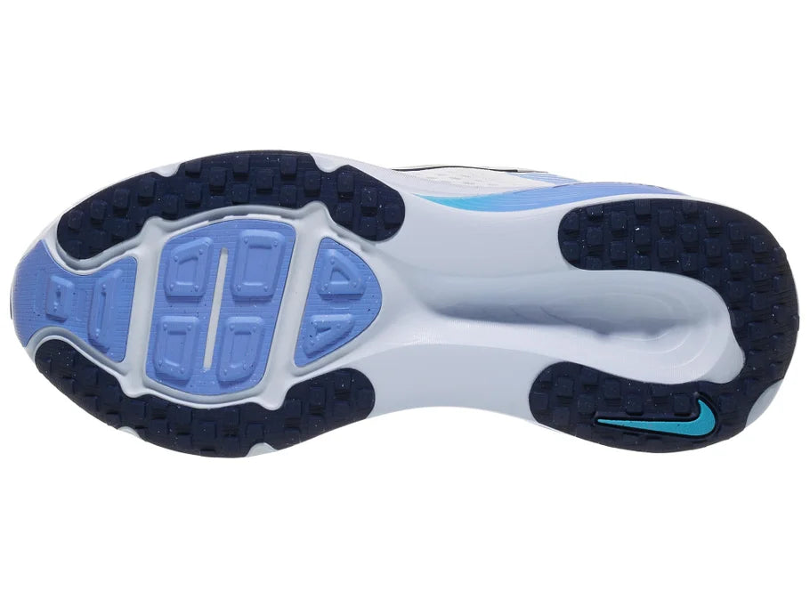 Women's Nike Vomero 18. White upper. Blue midsole. Bottom view.