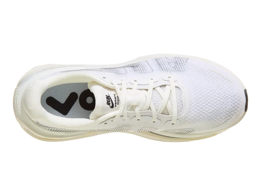 Women's Nike Vomero Premium. White upper. Off White midsole. Top view.