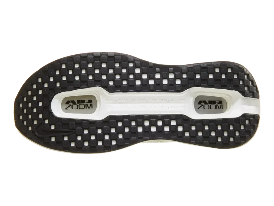 Women's Nike Vomero Premium. White upper. Off White midsole. Bottom view.