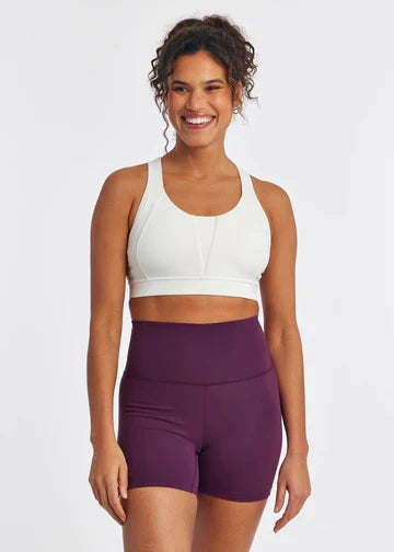 Women's Oiselle Double Breasted Bra in White, front view.