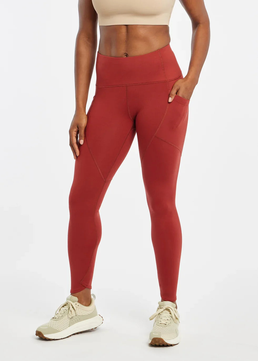 Women's Oiselle Flyout Tights in Redwood red, front view.