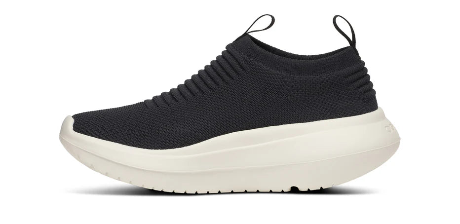 Women's Oofos OOmy Zen. Black upper. White midsole. Medial view.