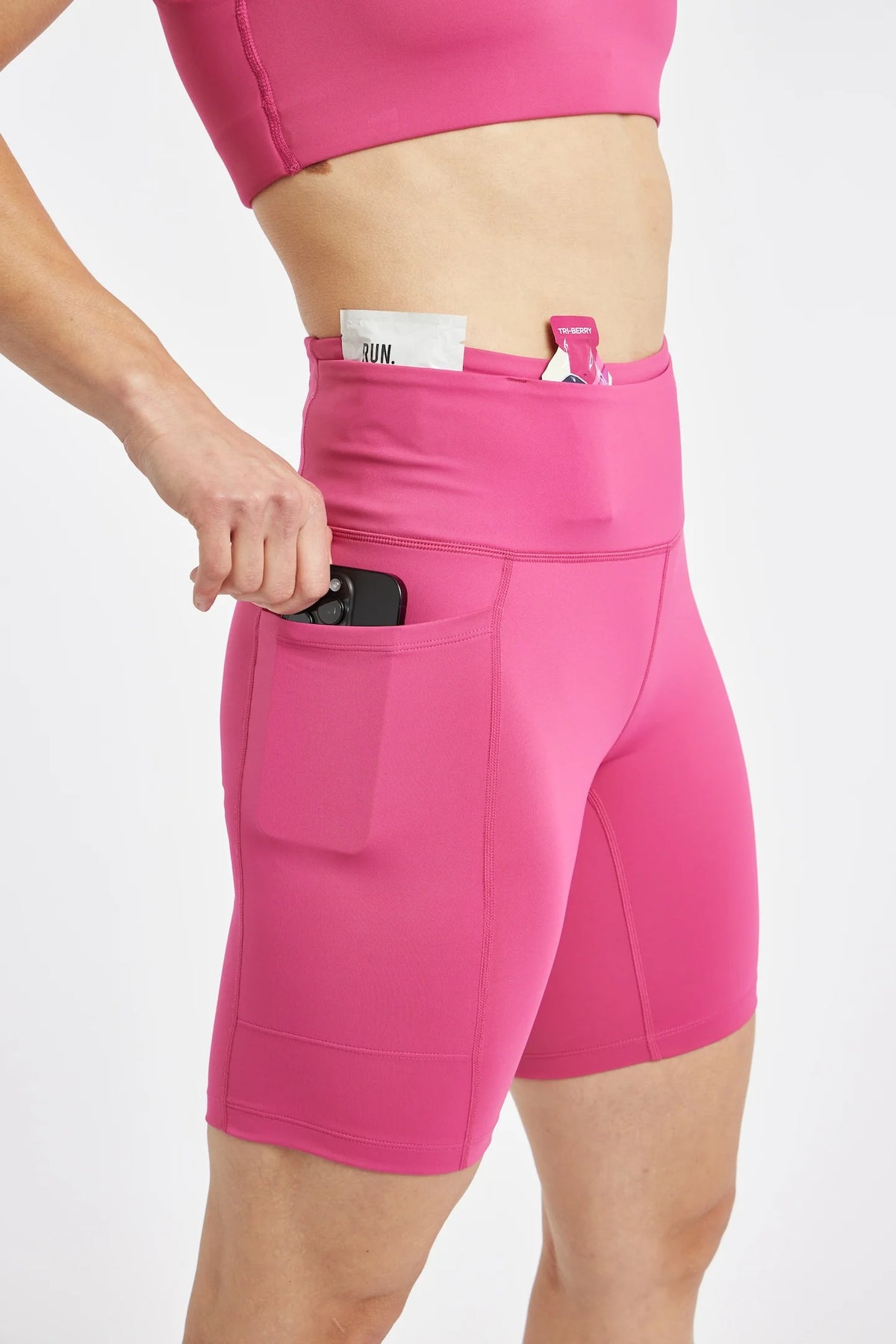 Oiselle Pockito 8" Shorts. Pink.