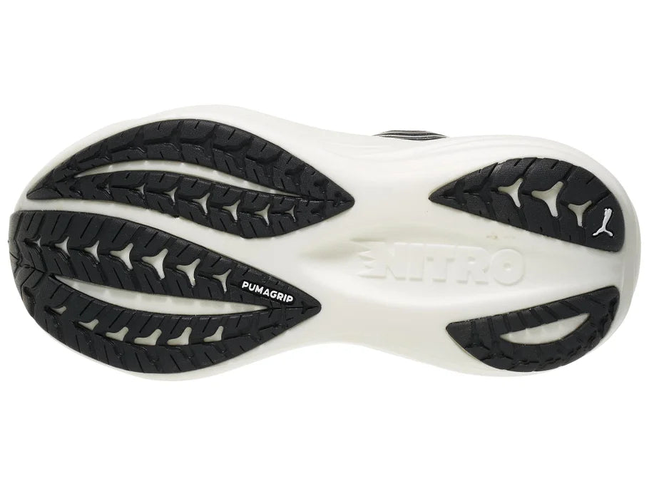 Women's PUMA MagMax Nitro 2. Black upper. White midsole. Bottom view.