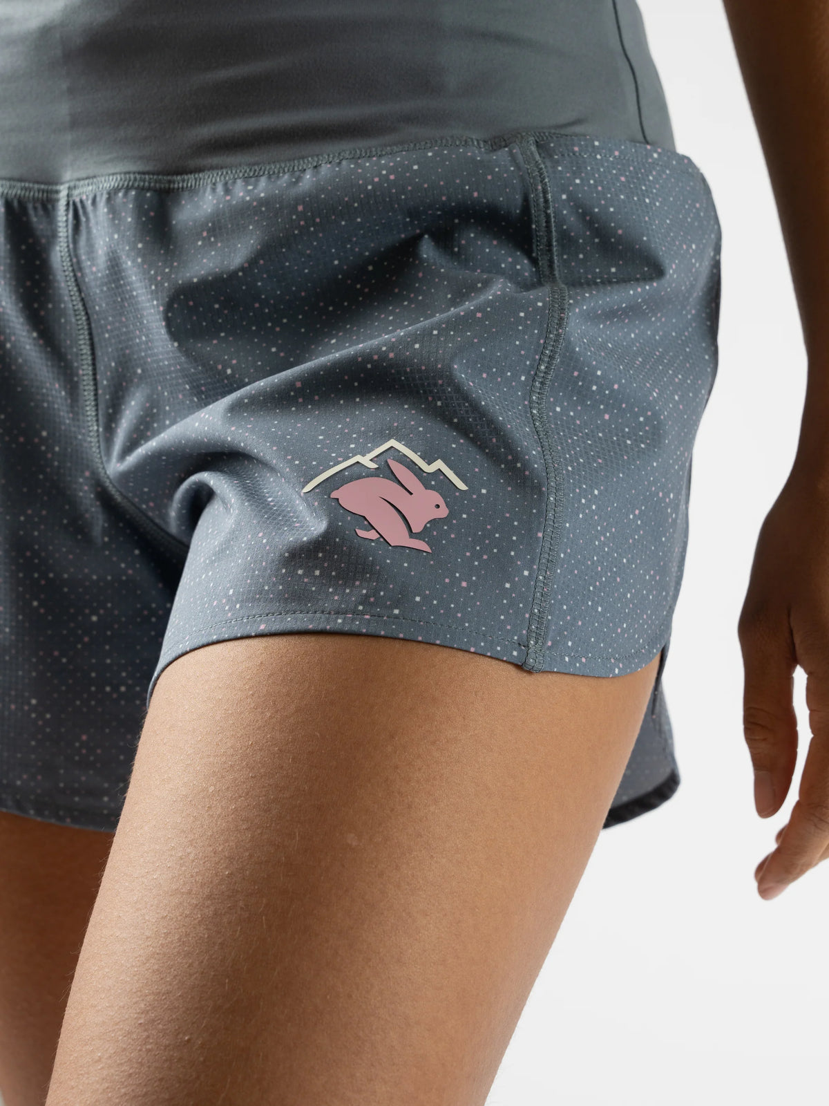 Women's Rabbit Summit Chasers 4". Grey and blue, with pink and white small dots. Pink log. Front view, up close.