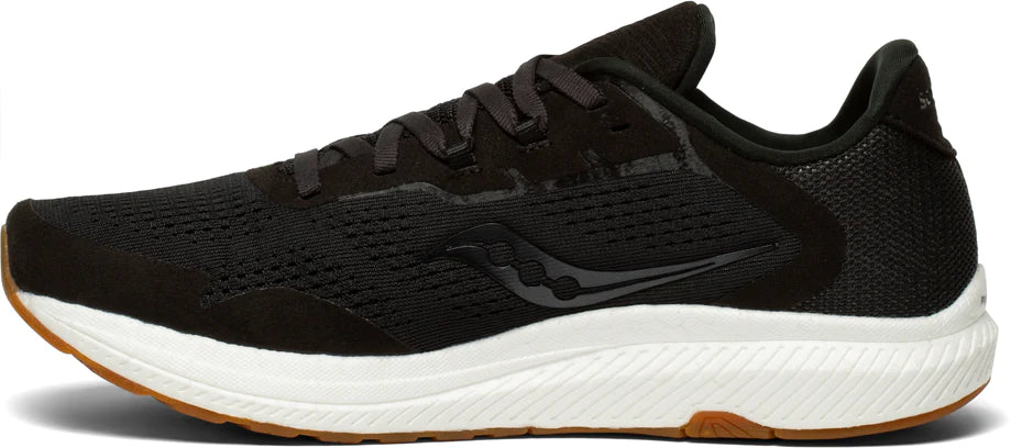 Women's Saucony Freedom 4. Black upper. White midsole. Medial view.