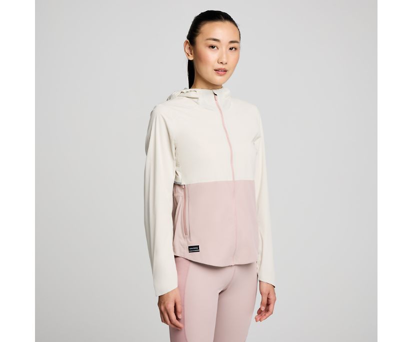 Women's Saucony RunShield Jacket. White/Pink. Front view.