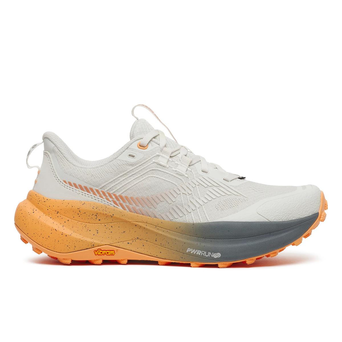 Women's Saucony Xodus Ultra 4. White upper. Orange midsole. Lateral view.
