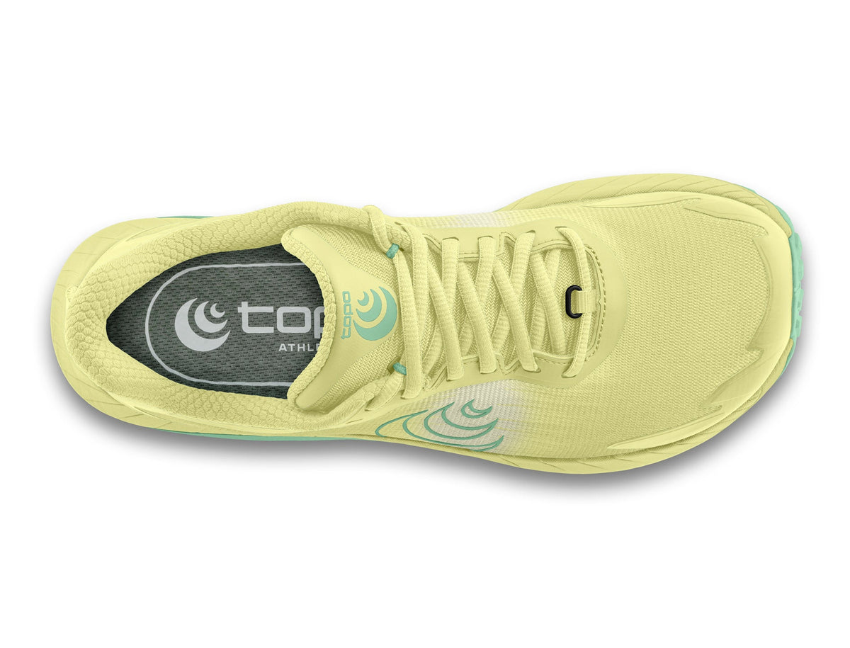 Women's Topo MTN Racer 4. Yellow upper. Yellow and green midsole. Green logo. Top view.