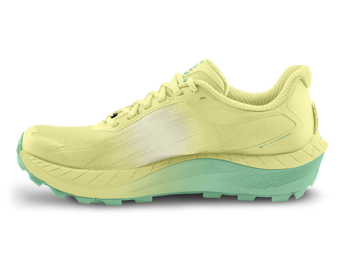Women's Topo MTN Racer 4. Yellow upper. Yellow and green midsole. Medial view.