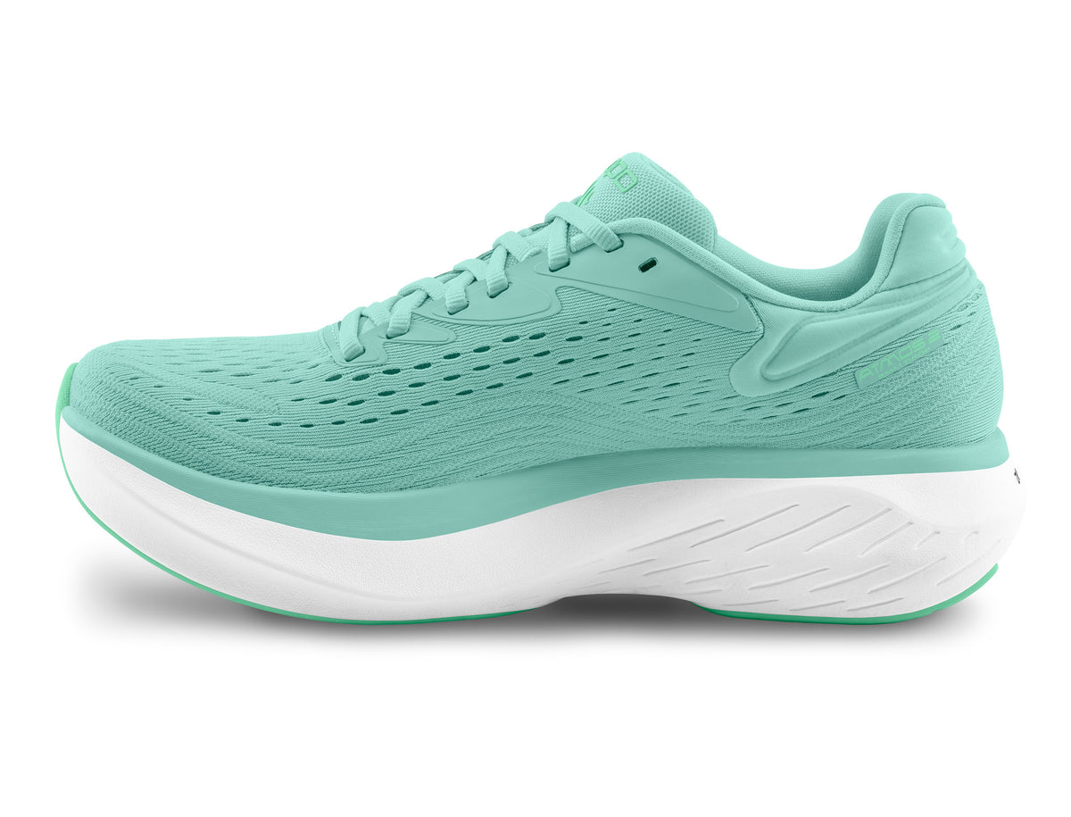 Women's Topo Atmos 2. Green upper. White midsole. Medial view.