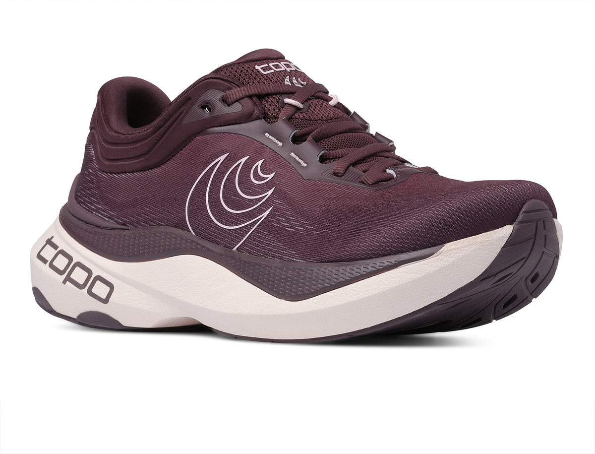 Women's Topo Aura 2. Maroon upper. White midsole. Lateral view.