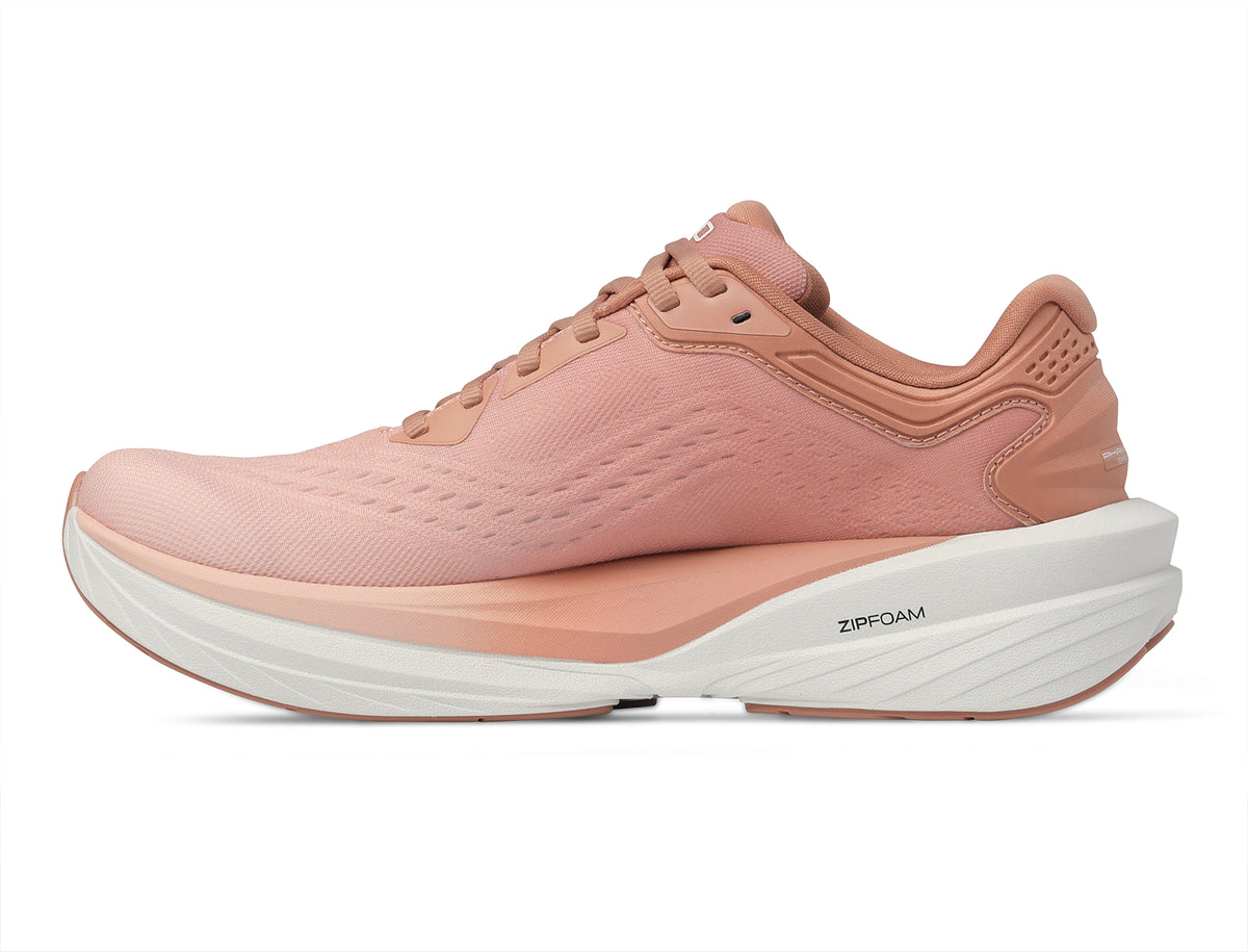 Women's Topo Phantom 4. Pink upper. White midsole. Medial view.