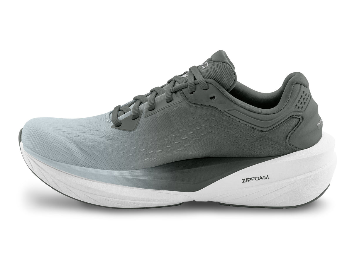 Women's Topo Phantom 4. Grey upper. White midsole. Medial view.