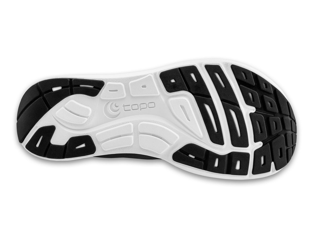 Women's Topo ST-6. Black upper. White midsole. Bottom view.