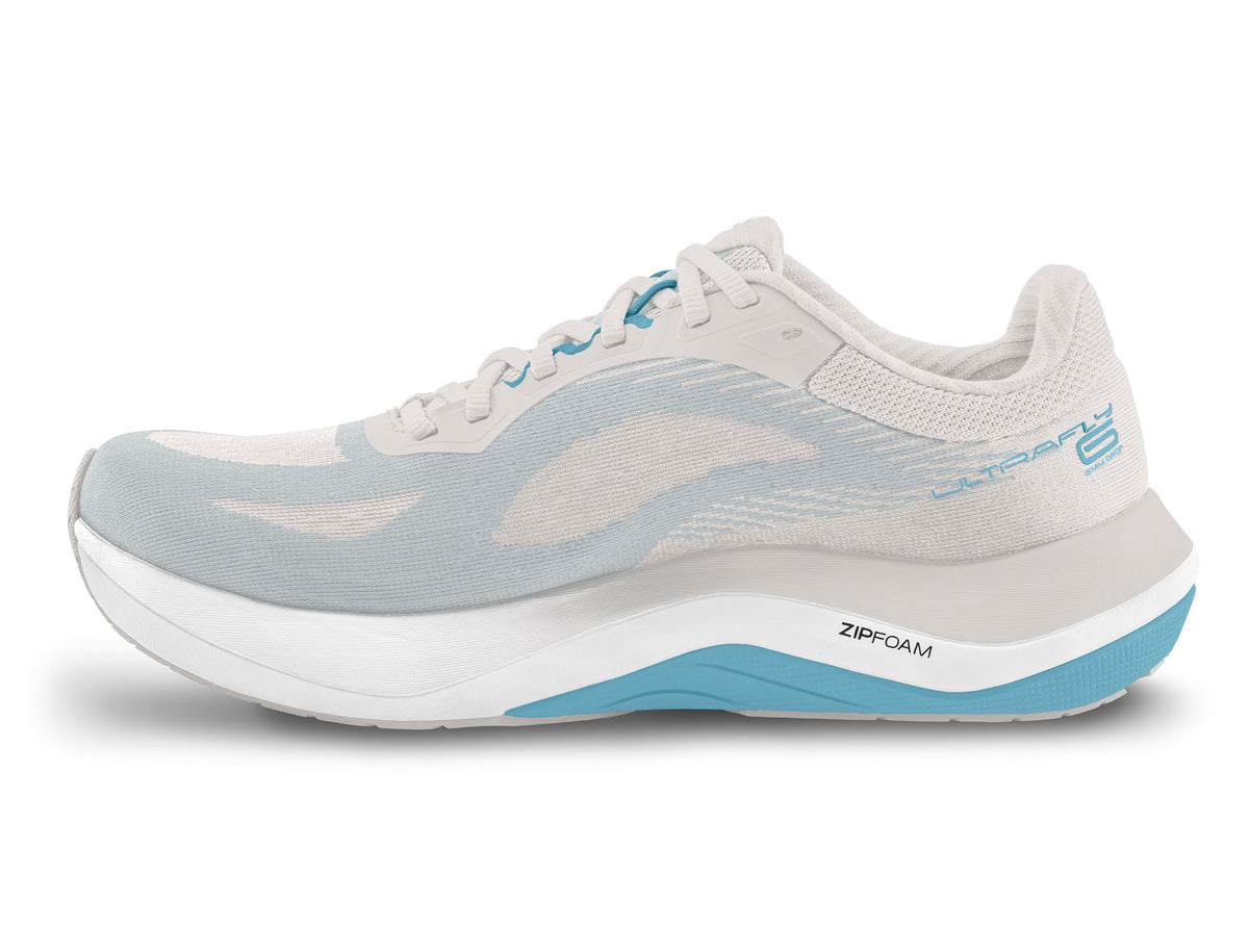 Women's Topo Ultrafly 6. Grey upper. White midsole. Medial view.