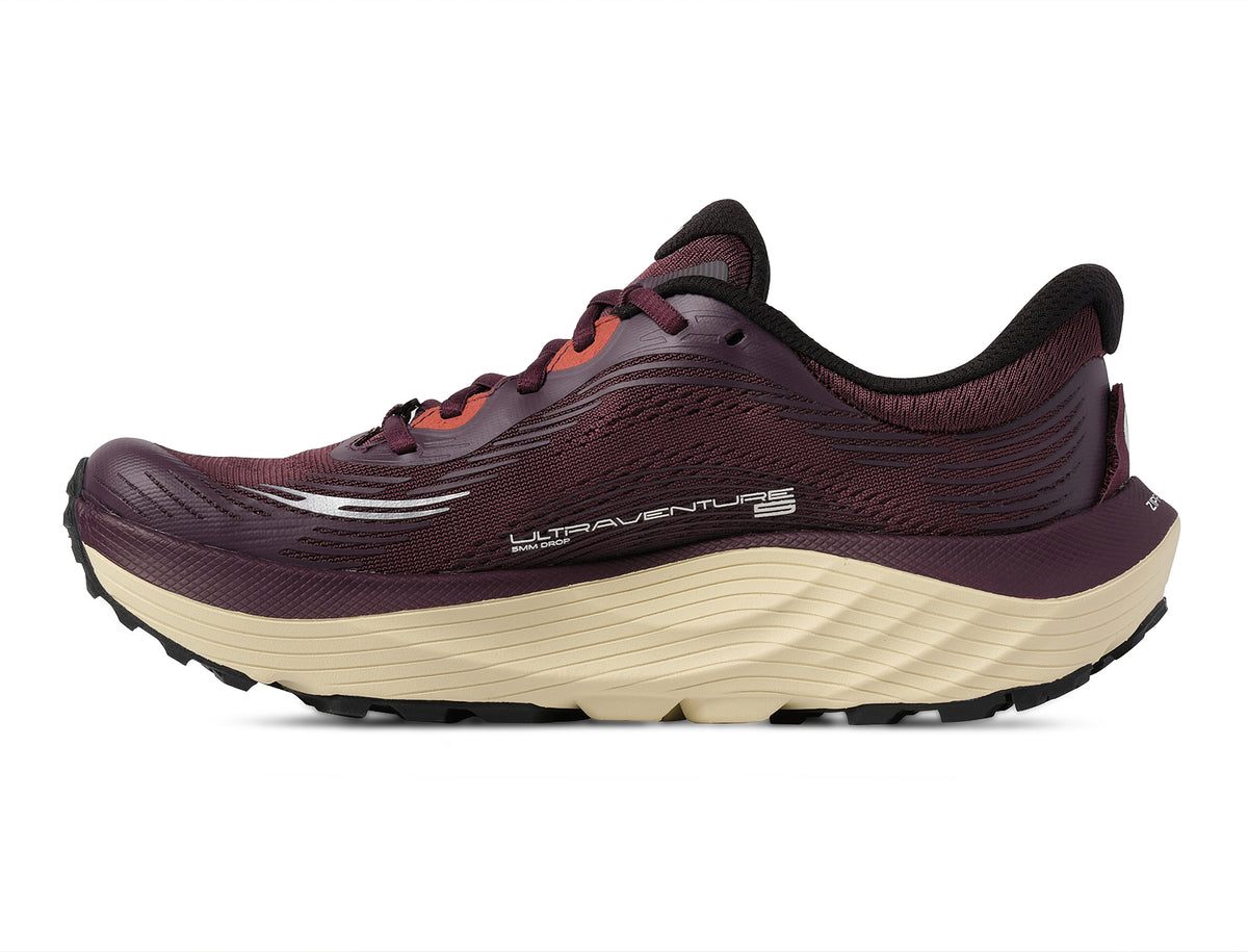 Women's Topo Ultraventure 5. Maroon upper. Tan midsole. Medial view.