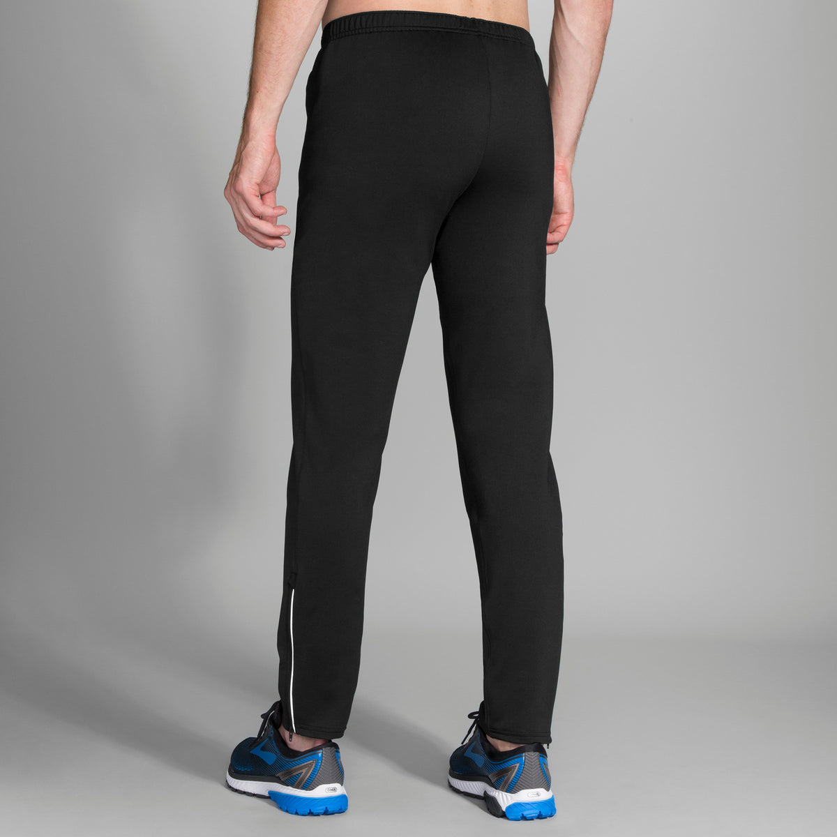 Men's Brooks Spartan Pants. Black. Rear/Lateral view.