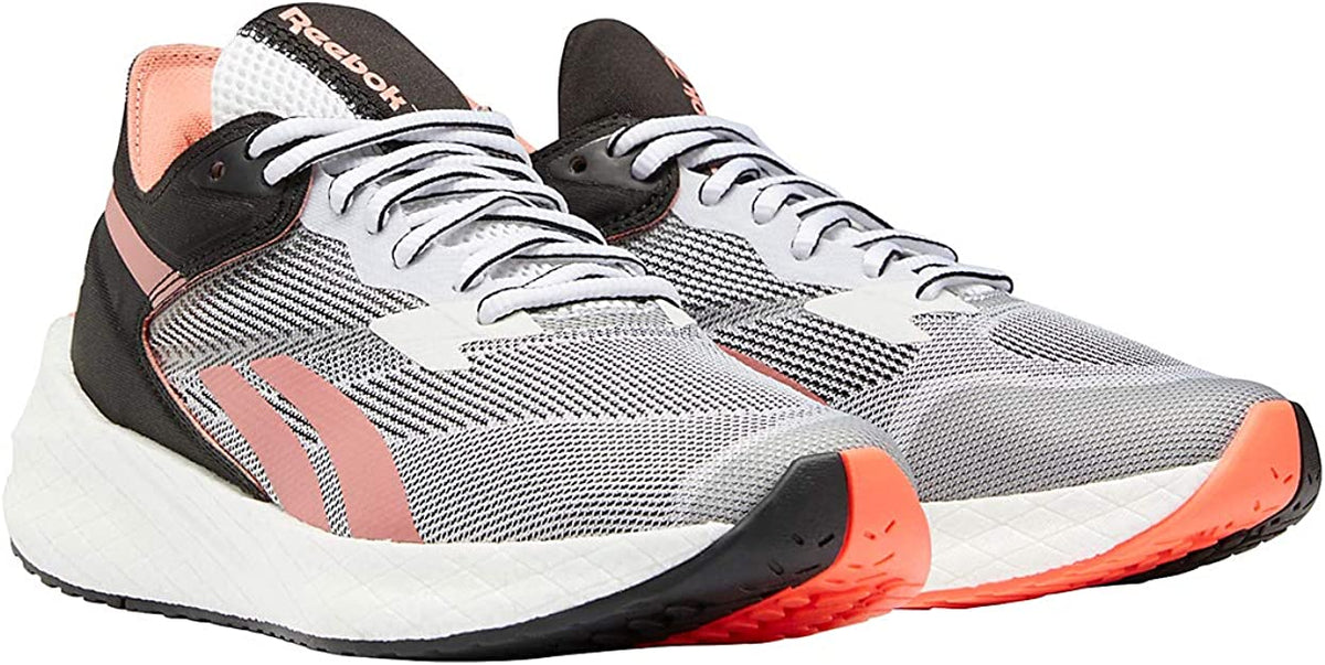 Women's Reebok Floatride Energy Symmetros. Grey upper. White midsole. Lateral view.