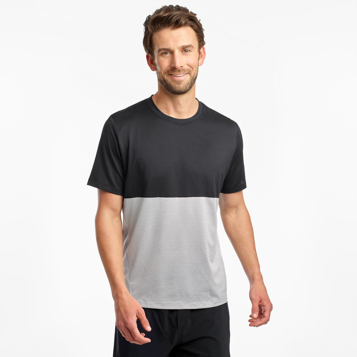 Men's Saucony ReRun Short Sleeve. Black/White. Front view.