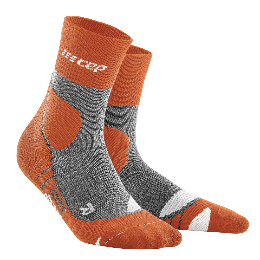Men's CEP Hiking Merino Mid Cut Compression Socks. Red. Lateral view.