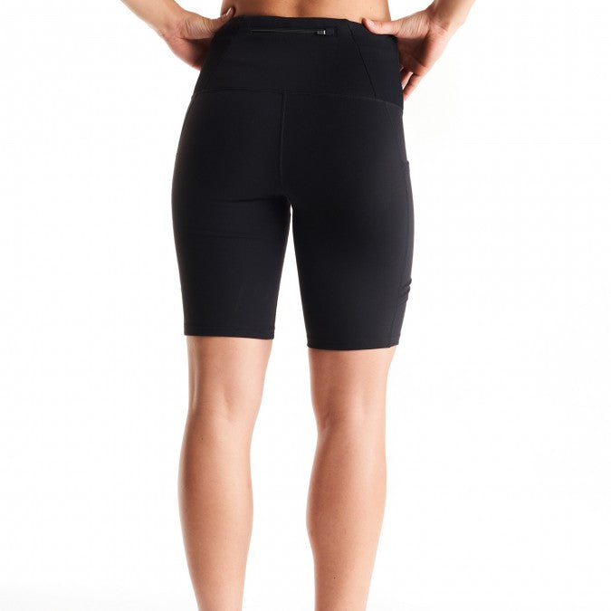 Women's Oiselle Long Pocket Jogger Shorts. Black. Rear view.