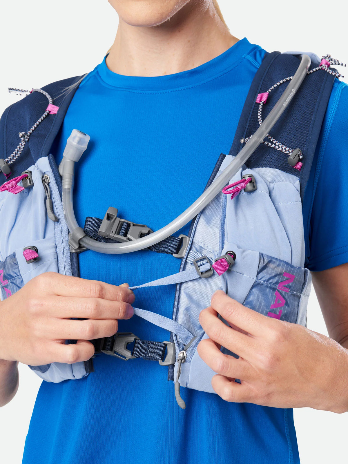 Women's Nathan Vapor Airess 3.0 7 Liter Hydration Vest. Light Blue. Front view.