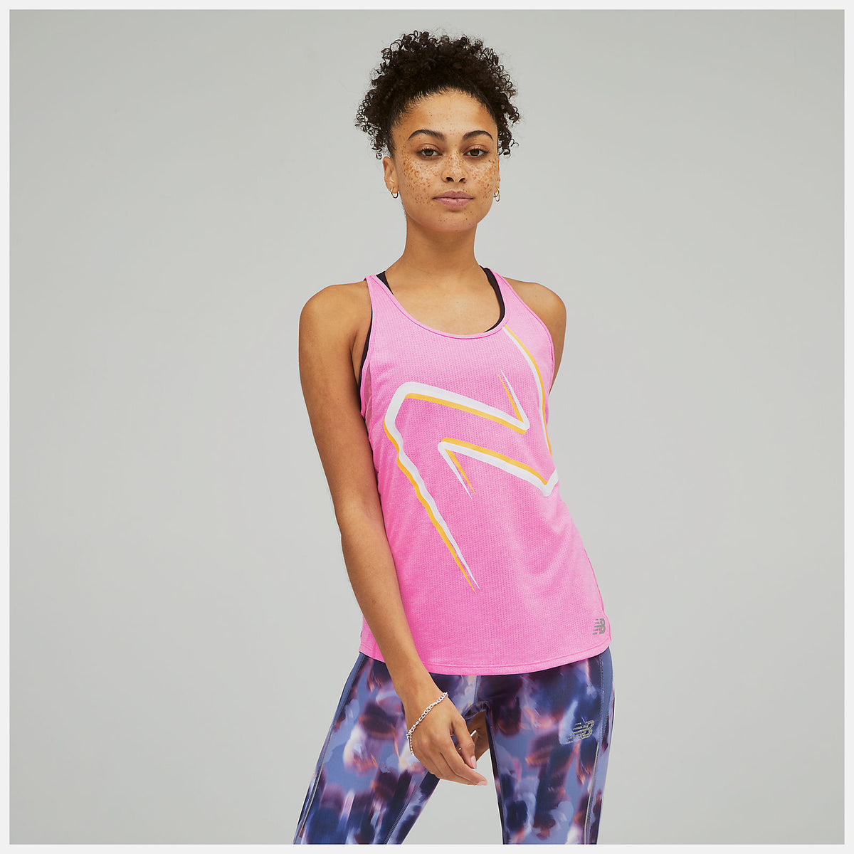 Women's New Balance Impact Tank. Pink. Front view.