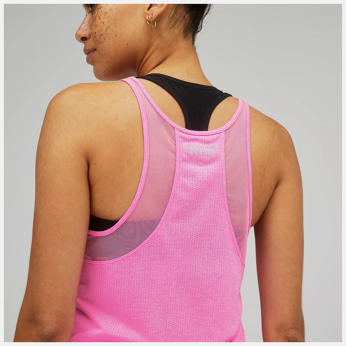 Women's New Balance Impact Tank. Pink. Rear view.