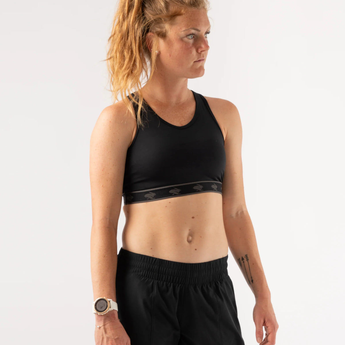 Women's rabbit Sports Bra. Black. Front view.