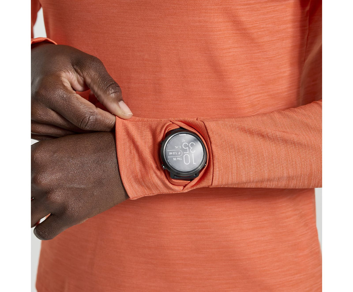 Women's Saucony Boulder Base Layer. Orange. Sleeve Closeup.