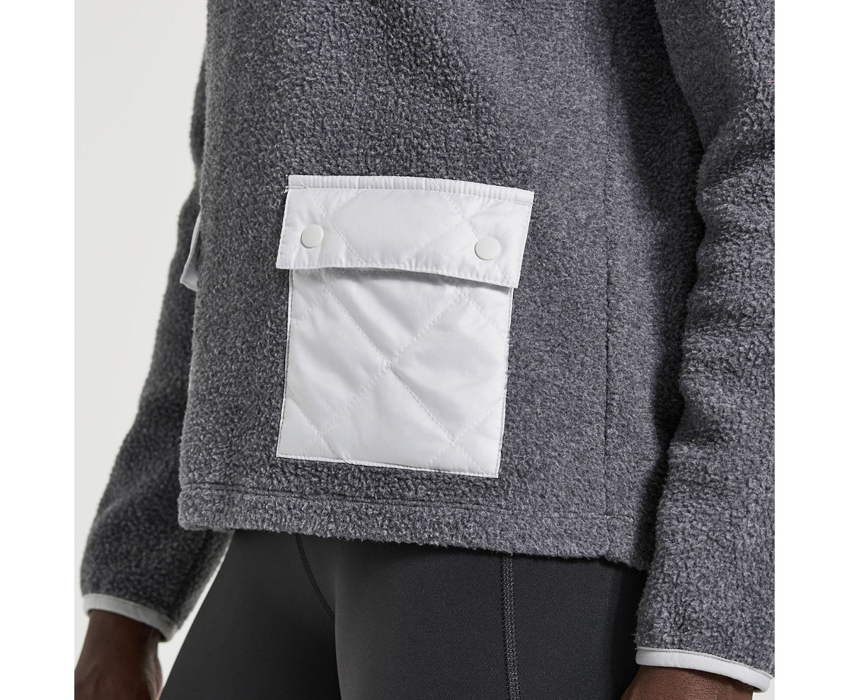 Women's Saucony Rested Sherpa 1/4 Zip. Grey. Pocket closeup.