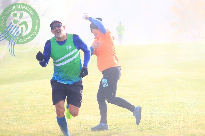 Jess and Mike share a playful moment near the overlapping finish and 1.5-mile crossing at STXC Race 3 in Marathon, NY