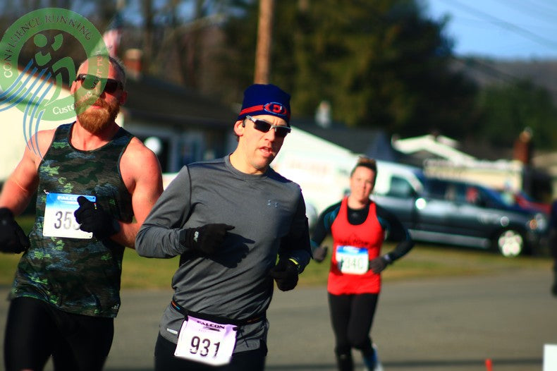 Andrew Cloke racing uphill during the 2026 Forks XV 15K