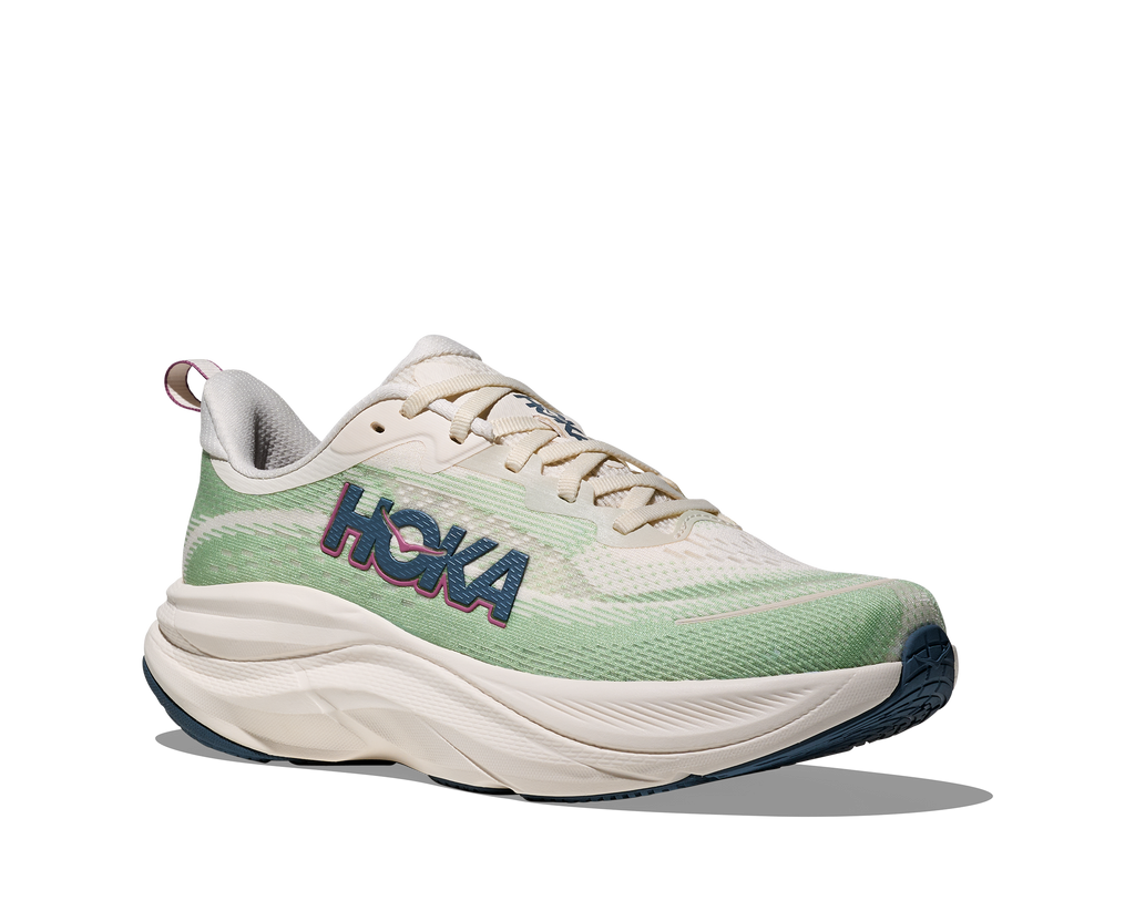 Women's Hoka Skylfow. Light Green upper. White midsole. Lateral view.