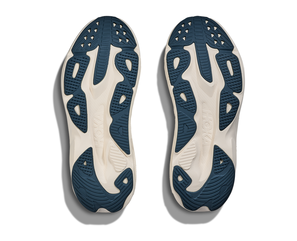 Women's Hoka Skylfow. Light Green upper. White midsole. Bottom view.