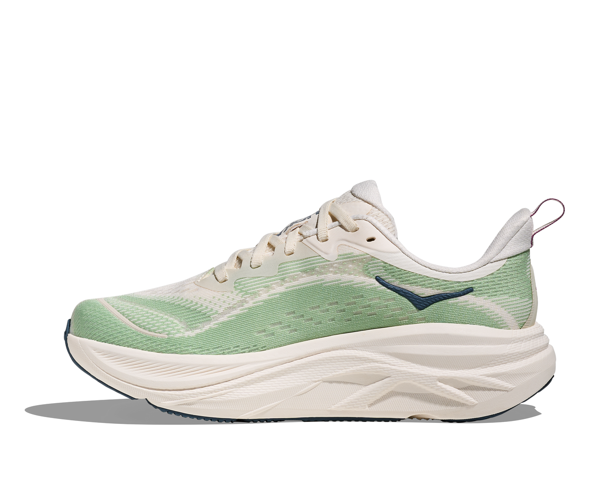 Women's Hoka Skyflow. Alabaster/Vintage Green. Medial view.