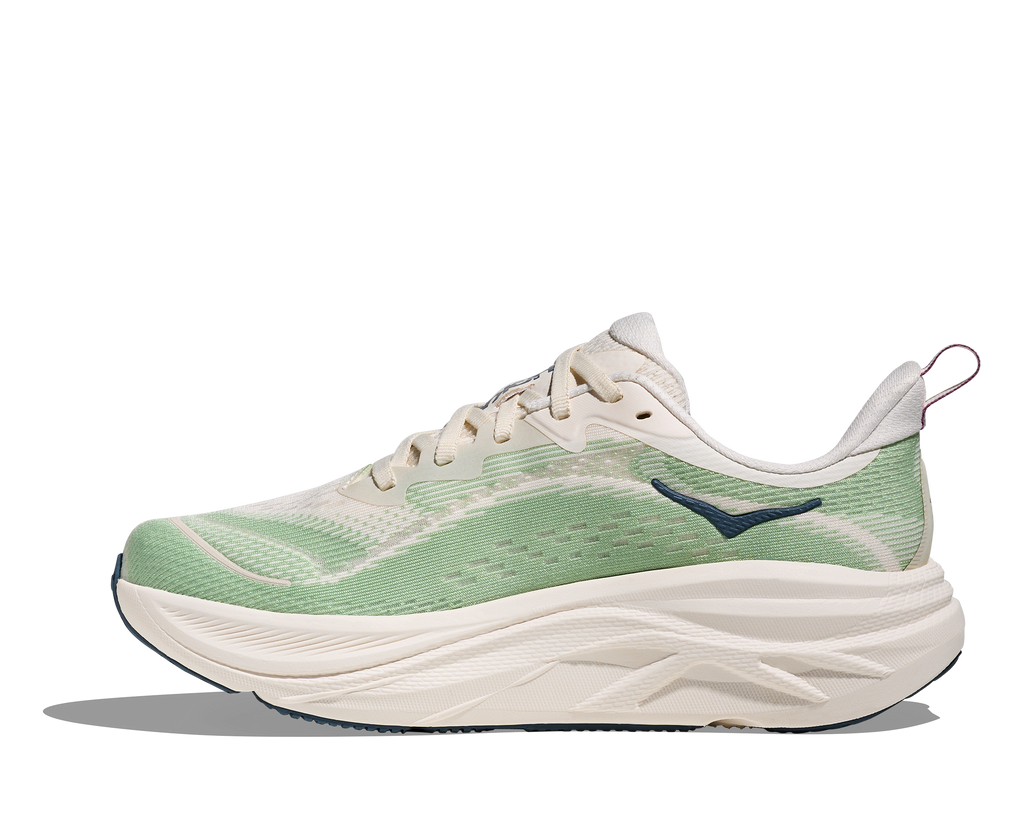 Women's Hoka Skylfow. Light Green upper. White midsole. Medial view.