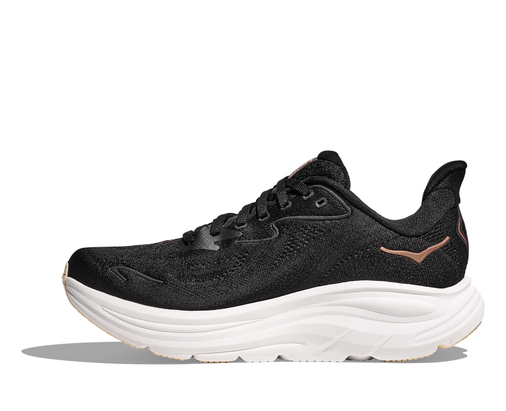 Women's Hoka Clifton 10. Black upper. White midsole. Medial view.