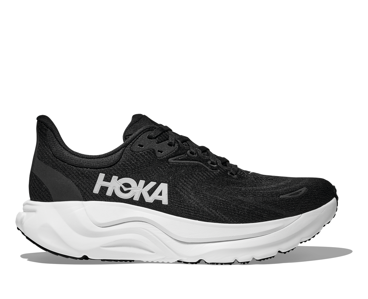 Men's HOKA Arahi 8 in Black/White, lateral view.
