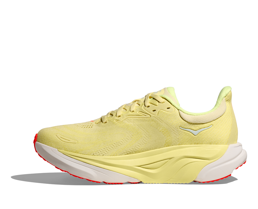 Women's Hoka Arahi 8. Yellow upper. White midsole. Medial view.
